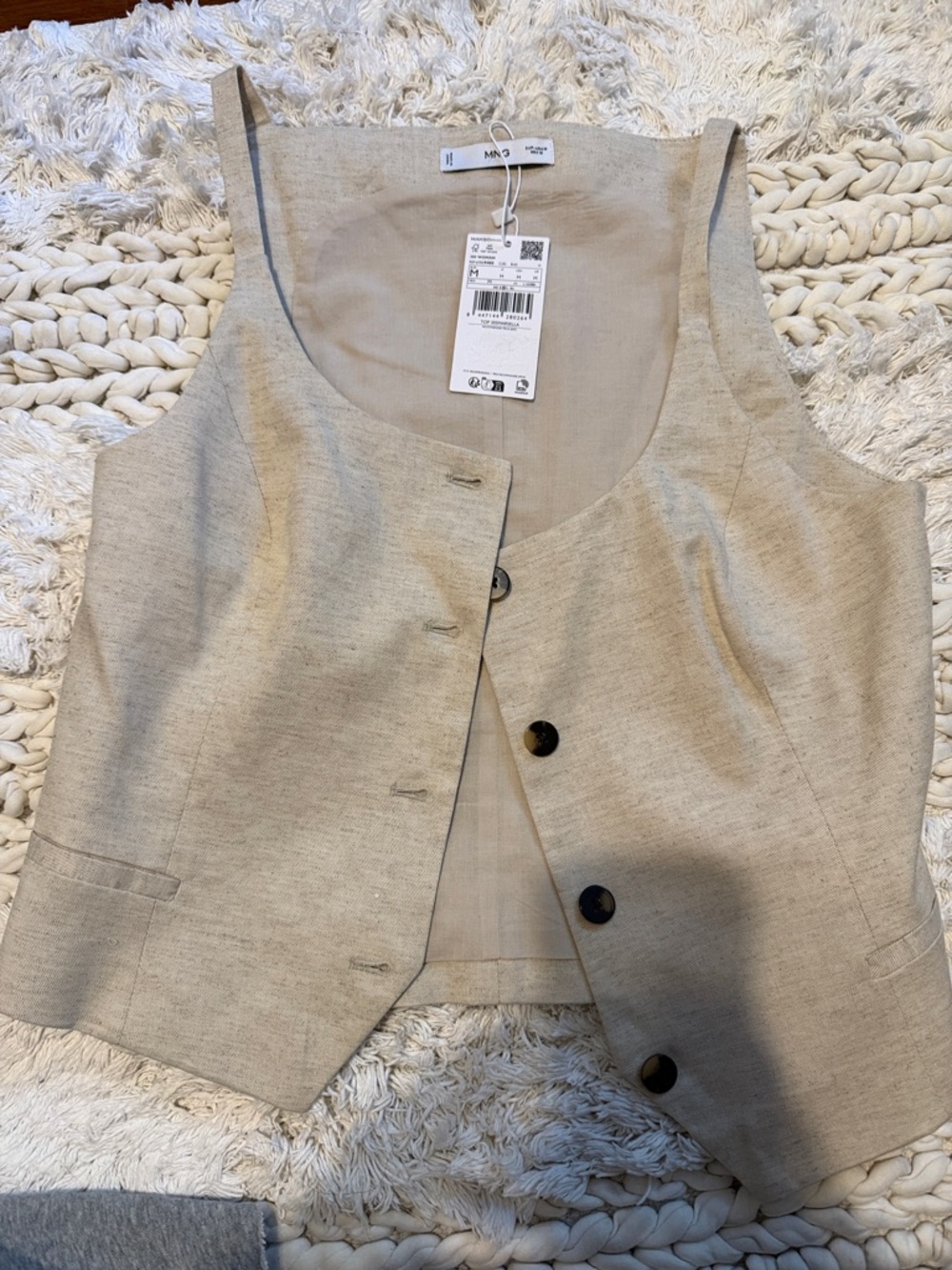 Mango’s Beige Button Front Vest
